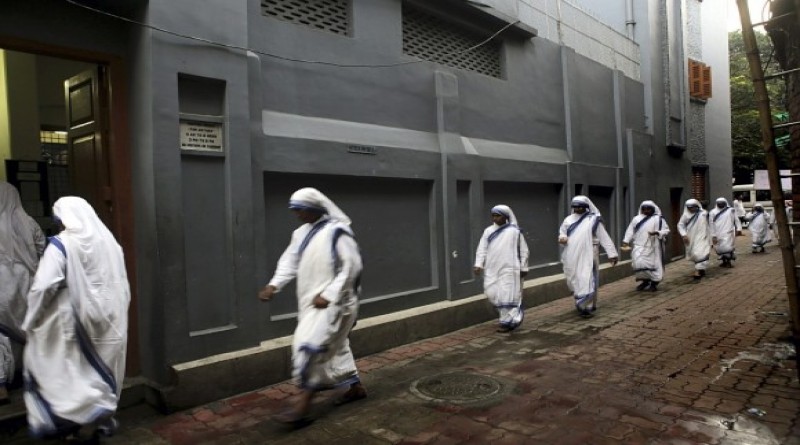 epa04385310 Nuns walk as they take part in a prayer during a mass marking Mother Teresa's death anniversary at the Missionaries of Charity in Calcutta, India, 05 September 2014. Mother Teresa was born Agnes Gonxha Bojaxhiu on 26 August 1910 to Albanian parents in Skopje. She began her missionary work with the poor in Calcutta in 1948 and won the Nobel Peace Prize in 1979. Following her death in 1997 she was beatified by Pope John Paul II and given the title Blessed Teresa of Calcutta.  EPA/PIYAL ADHIKARY