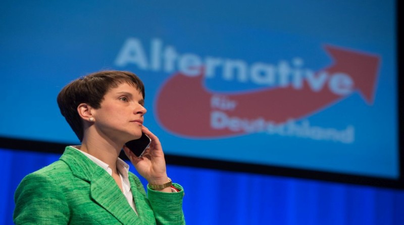 epa05283784 AfD party leader Frauke Petry speaks on her mobile telephone during the 5th party convention of the Alternative for Germany (AfD) in Stuttgart, Germany, 30 April 2016. Reports state that hundreds of left wing protestors demonstrated outside the venue with the aim of stopping people attending the conference. German right-wing anti-migration Alternative for Germany (AfD) has recently come under criticism for remarks about the Islam.  EPA/MARIJAN MURAT